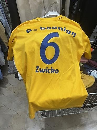 lik: JAKO brendinin futbol maykası - Rəng: sarı, mavi detallarla - Arxa — 1