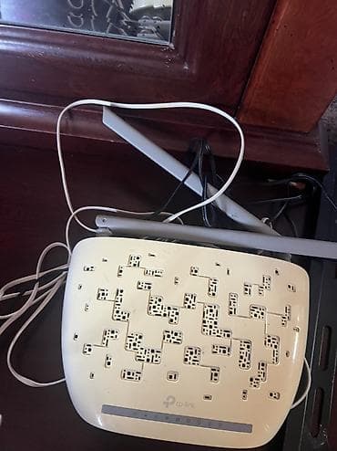 ev modemi: TP-Link TD-W8961N ADSL2+ Wi‑Fi router Xüsusiyyətlər: - Model: TP-Link — 1