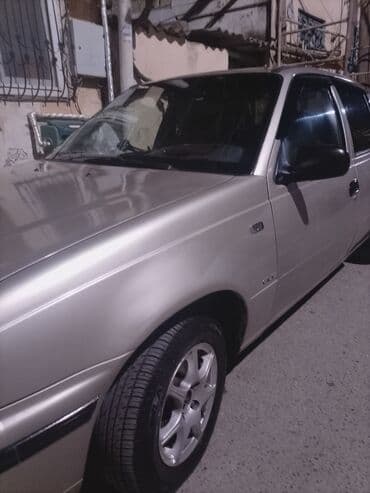 матиз 2 ош: Daewoo Nexia sedan - Kuzov: 4 qapılı sedan, gümüşü rəng - Nömrə — 3