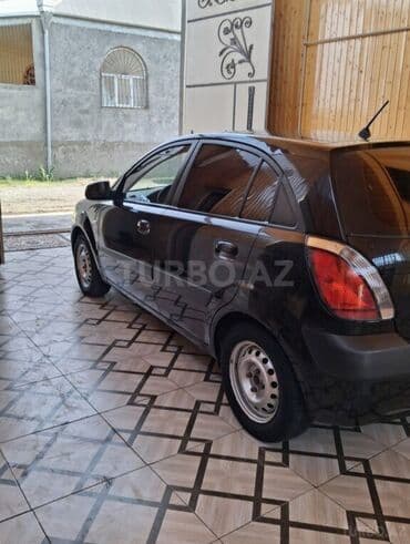 фольксваген поло новый кузов: Kia Rio: 1.4 л | 2005 г. Хэтчбэк — 4