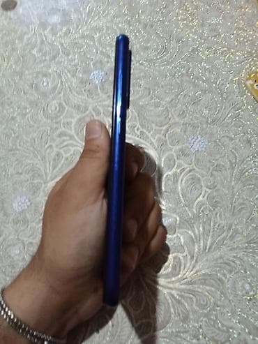 Xiaomi Redmi (mavi rəng) smartfon Xüsusiyyətlər: - Arxa tərəfdə — 2