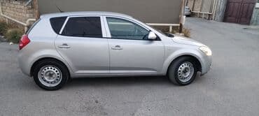 авто под выкуп бишкек: Kia Cee’d, gümüşü rəngli hetçbek. Xarici: - Orijinal Kia radiator — 9