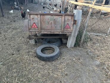 lapet qoşqu: Yük daşımaq üçün nəzərdə tutulmuş metal kuzalı qoşqu. Paslı görünüşə — 2