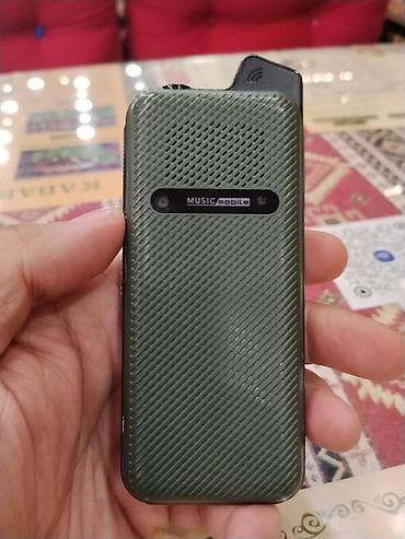 Mini düyməli telefon – SQ7600s “Music Mobile” Xüsusiyyətlər: -