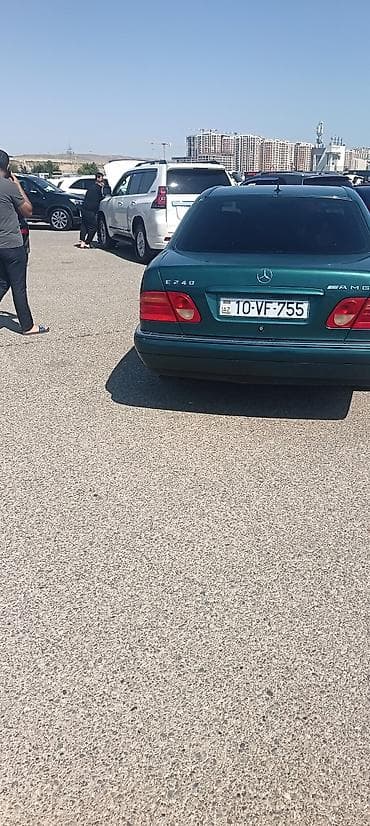 w210 disk: Mercedes-Benz E-Class: 2.4 l | 1998 il Sedan — 10