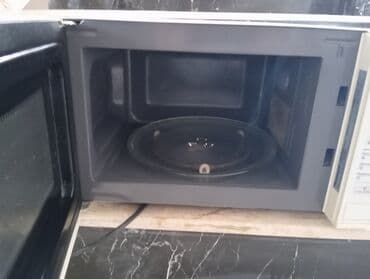 tum qovuran aparat: Mikrodalğalı soba Panasonic satılır tam işlək vəziyyətdə yenisini — 9