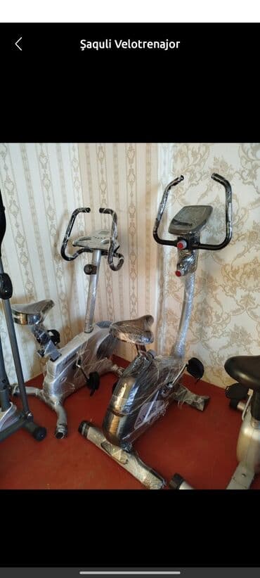 Şaquli velotrenajor - Ev və fitness zalı üçün şaquli (upright) tip