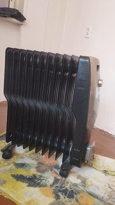 Elektrik yağ radyatoru – çoxseksiyalı, təkərli model - Güclü elektrik