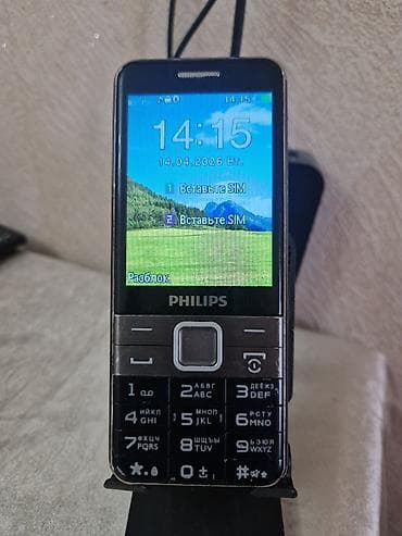 Philips Xenium düyməli mobil telefon Xüsusiyyətlər: - İki SIM dəstəyi