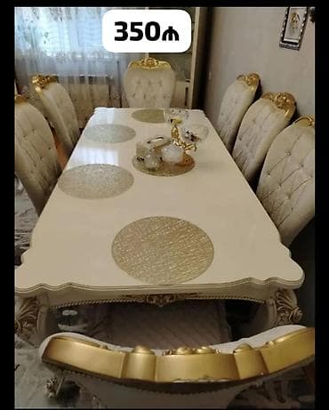 Masa dəsti 8 stulla 350₼. Oturacaqların 4 ədədində boşluq var. Ünvan — 1