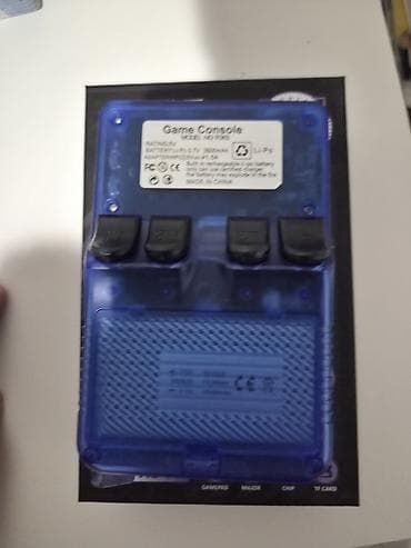 oyun konsoları: Daşınan Retro Oyun Konsolu – mavi şəffaf korpus Xüsusiyyətlər: - — 2