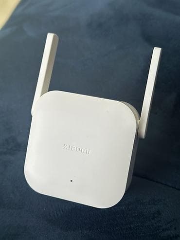 ev modemi: Xiaomi Wi‑Fi Range Extender N300 Açilib ama islenilmiyib kontakt — 4