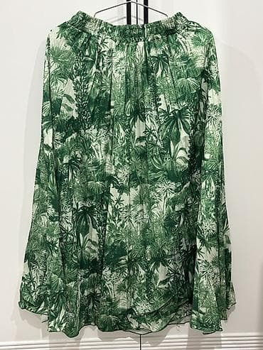 Yüngül yaşıl ətək Alan şəxsə endirim ediləcək. Ortaq qiymətlə