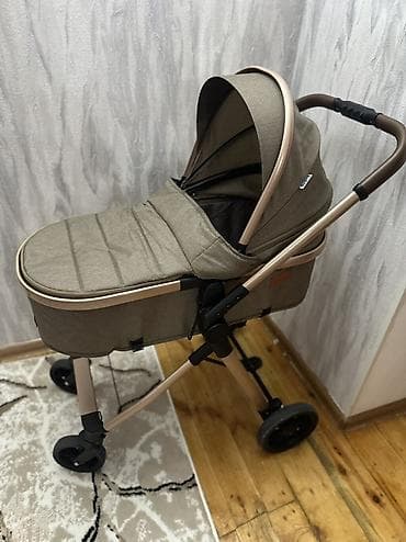 Uşaq geyimi və ayaqqabıları: Çıxarıla bilən beşikli araba, Kidilo, Ünvandan götürmə — 1