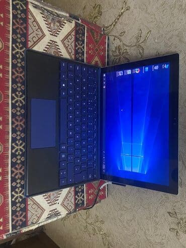 Qaşıqlar: Microsoft Surface Pro 4 Guclu notbukdur Parametrler sekilde gorunur — 3