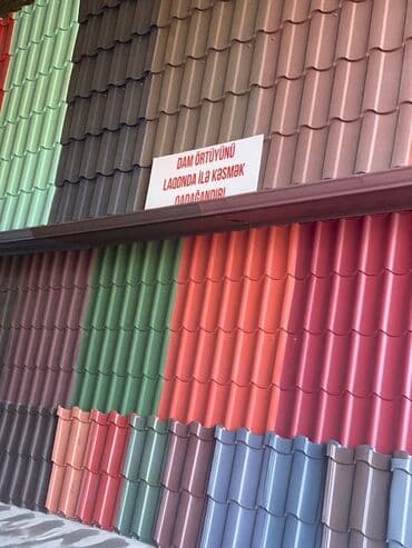 yağmur su cənləri: Bina damlarından suyun kənara axıdılması üçün nəzərdə tutulmuş metal — 8