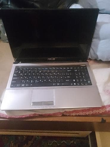 ASUS noutbuku - Brend/model: ASUS (qara qapaqlı, gümüşü klaviatura