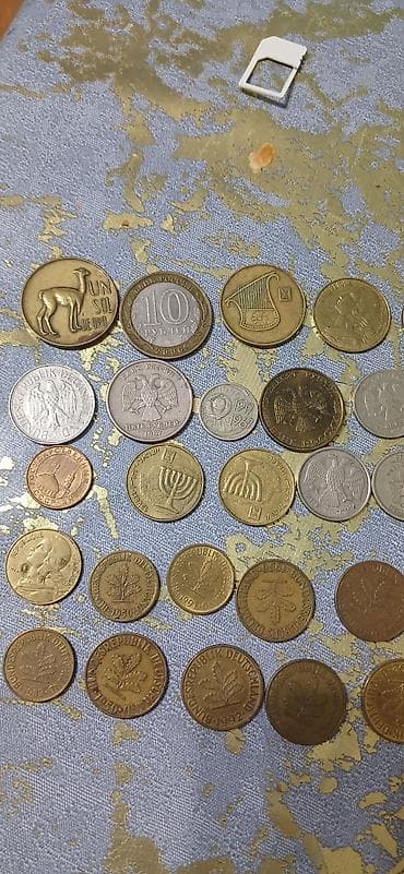 Velosiped ehtiyyat hissələri: SSR dövrünə aid xırda pul və yubiley sikkələri kolleksiyası Tərkib: - — 7