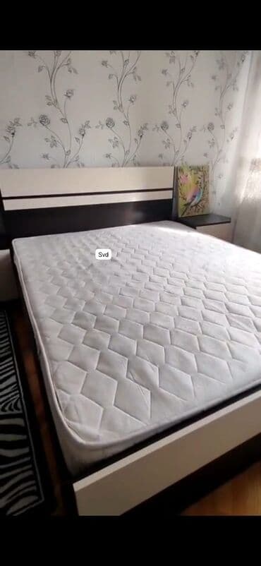 İkinəfərlik çarpayı