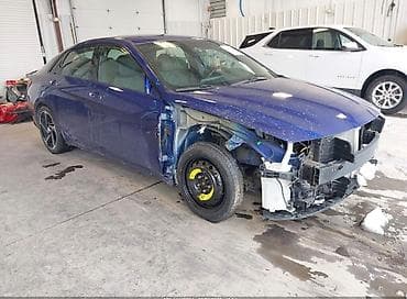 hyundai elantra teker: Hyundai Elantra, mavi rəng, sedan kuzov. Xüsusiyyətlər: - Kuzov: 4 — 5