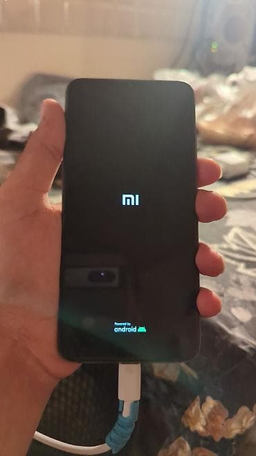 Xiaomi Mi 9, 64 GB, rəng - Göy, 
 İki sim kartlı, Face ID, Barmaq izi — 4