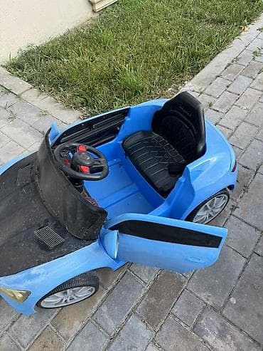 Uşaq üçün elektrikli minik maşını Islemir - Rəng: mavi/qara kapot -