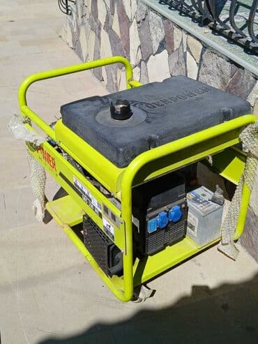 GenPower GBS 100 ME benzin generatoru, sarı rəngdə, daşıma üçün