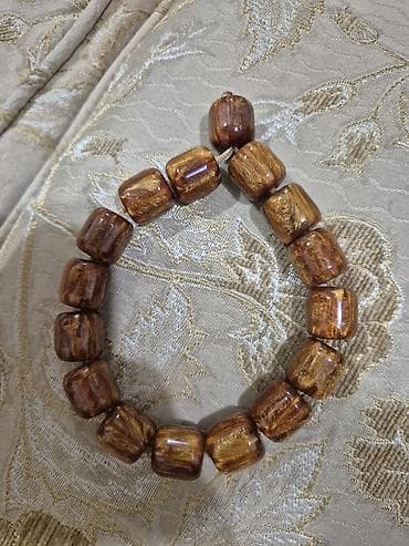 Təsbeh / Bilərzik – qəhvəyi-qızılı naxışlı muncuqlardan - Material lalafo.az -da Təsbeh / Bilərzik – qəhvəyi-qızılı naxışlı muncuqlardan - Material