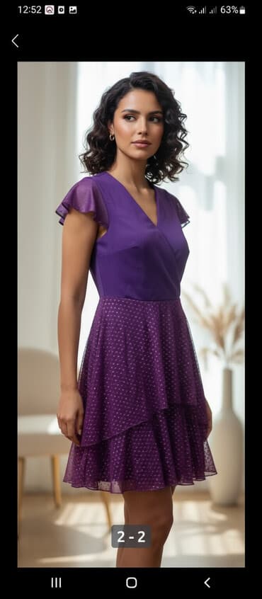 hazır hicablar: Bu geyim — qadın üçün nəzərdə tutulmuş, bənövşəyi rəngdə elegant bir — 1