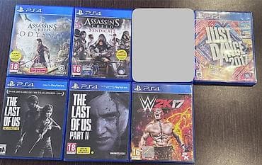 ps3 diskleri: Playstation 4 2 pult + 10 ədəd ps4 + 3 ədəd ps3 diski satılır. Üstündə — 3