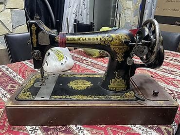 Mexaniki tikiş maşını – əl fırlatmalı, çuqun gövdəli klassik model