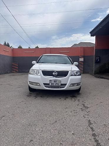 klas 6: Nissan Sunny: 1.6 l | 2007 il Sedan — 1
