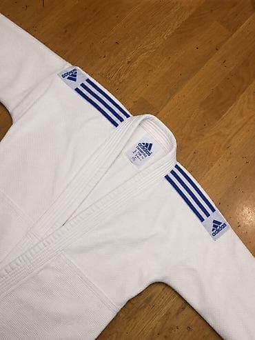 Brend: adidas Rəng: Ağ Növ: Döyüş sənətləri üçün kimono (gi) Material — 2