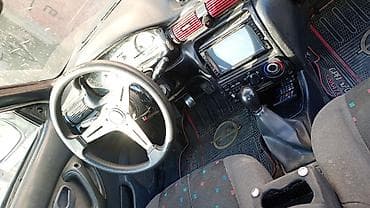 mini kia: Hyundai Accent: 1.5 l | 1994 il Sedan — 5