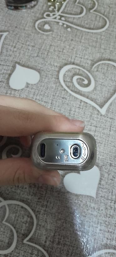 smart saat mi: Elektron siqaret cihazı (pod sistemi) - Kompakt metal gövdə, yuxarıda — 1