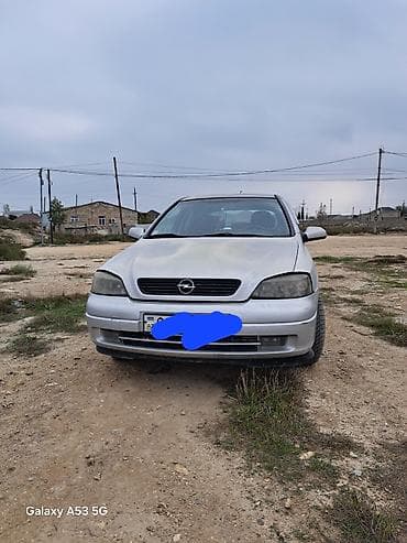 Opel Astra G sedan/hetçbek, gümüşü rəng. - Mühərrik: ECOTEC benzin, 4