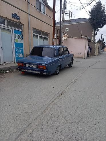 2106 salon: VAZ 2106 sedan - Kuzov: 4 qapılı klassik sedan, açıq-mavi rəng - — 2