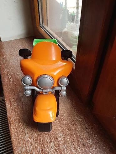 oyuncaq ayi type 1: Uşaq oyuncağı – plastik motosiklet - Parlaq narıncı rəngdə korpus — 1
