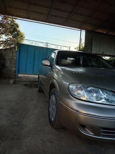 vaz qapi: Nissan Sunny sedan - Kuzov: 4 qapılı sedan, qızılı/metallik rəng - — 3