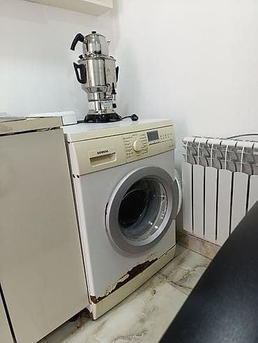 Paltar tikişi: Simens 7 kq paltaryuyan satilir.İşləməyində heç bir problem yoxdur əla — 2