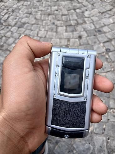 mini pirinter: Klassik qapaqlı mobil telefon - Korpus: metalik gümüş rəngli çərçivə — 1