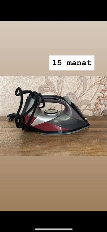 Buxarlı ütü - Şaquli və üfüqi buxar funksiyası olan elektrikli
