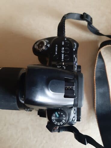 knopkalı: Fotoaparat Sony a500. Probeqi azdır. Şəkil çəkmək üçün knopkası — 10