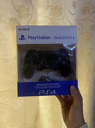 i̇phone 11pro max: Sony playstation 4 dualshock Acilmayib,karopkadadir.Uzerinde zaryatka — 1
