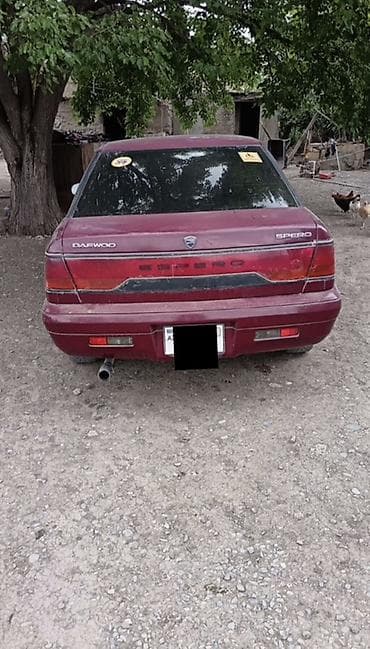 volta vs 1: Daewoo Espero: 1.5 l | 1996 il Sedan — 2