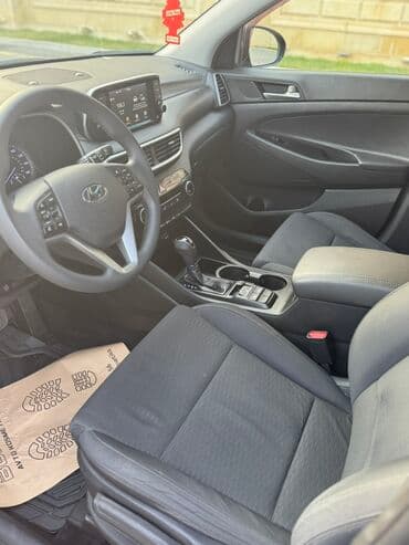 фольксваген тигуан 2 0: Tünd boz rəngdə olan Hyundai Tucson avtomobili. Bu avtomobil rahat — 3