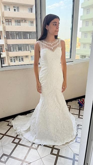 göz muncugu: Model: gəlinlik donu, “mermaid/fish” kəsim Rəng: ağ-ivory Material — 1