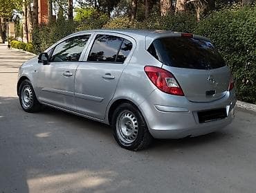 kuba portero 8000: Opel Corsa D, 5 qapılı hetçbek, gümüşü rəng. Texniki xüsusiyyətlər: - — 3