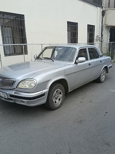 Продажа авто: GAZ Volga 3110, gümüşü rəng. Xüsusiyyətlər: - Kuzov: sedan, geniş — 5