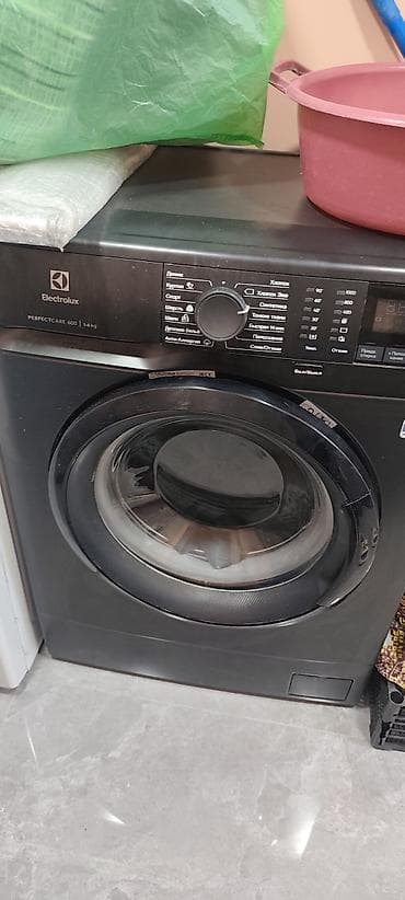 14 plus: Electrolux PerfectCare 600 paltaryuyan maşın (qara rəng) - Ön — 1
